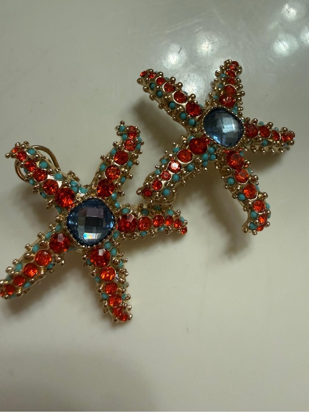 Gold Starfish Crystal Drop Earrings in Blue and Red